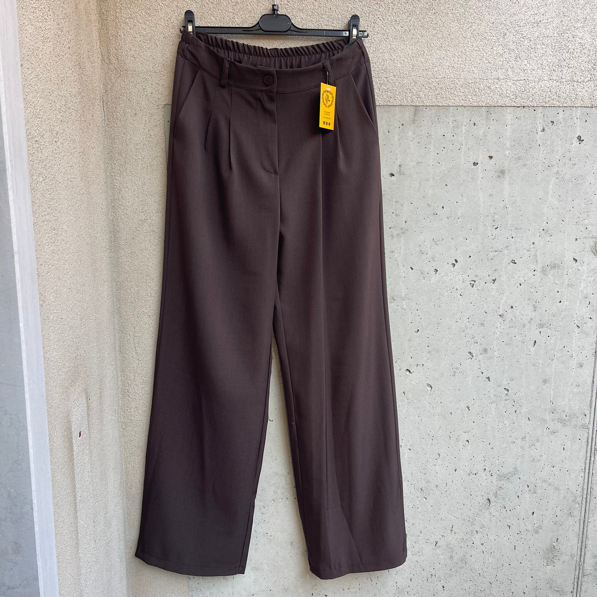 pantalone sartoriale marrone palazzo