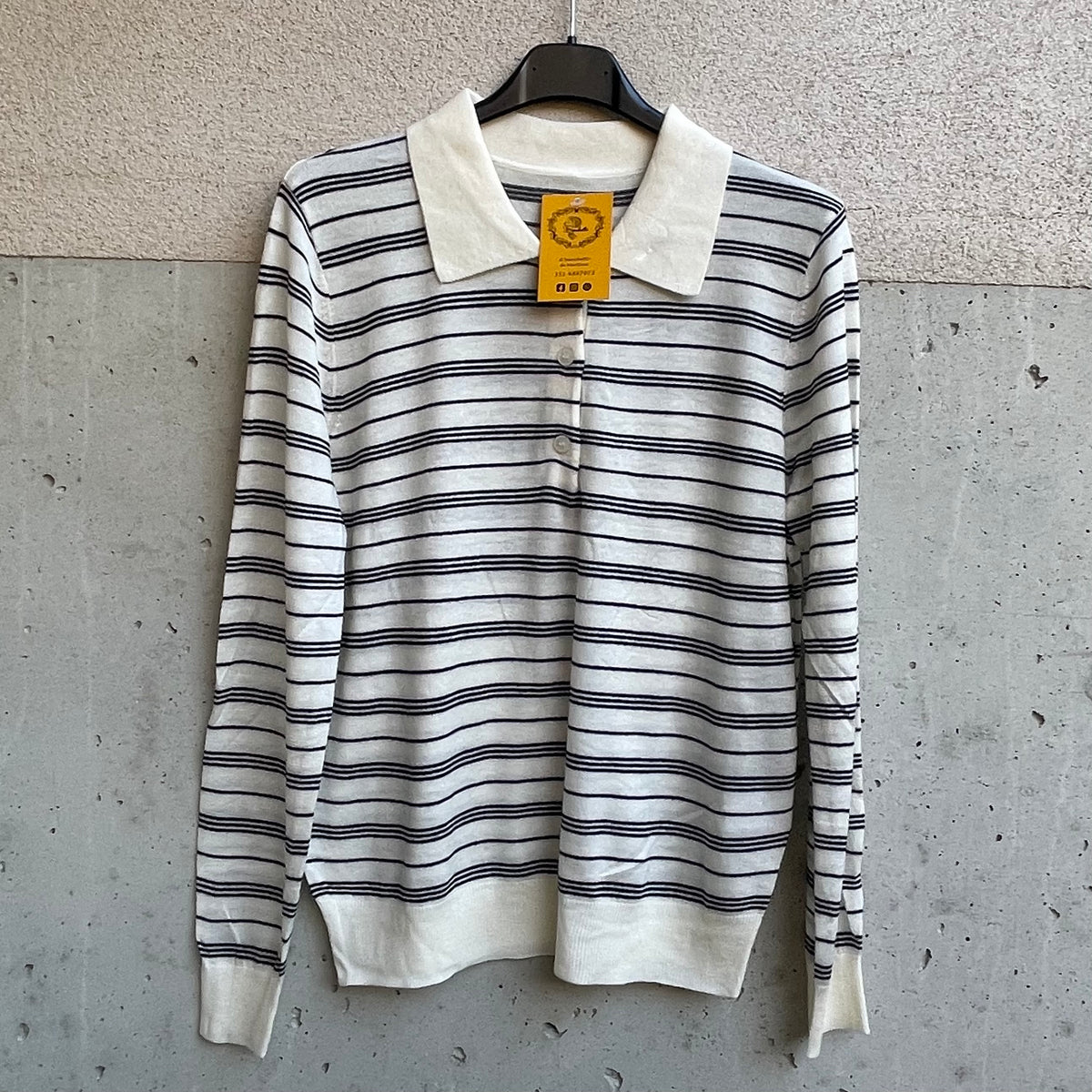POLO in maglia a righine